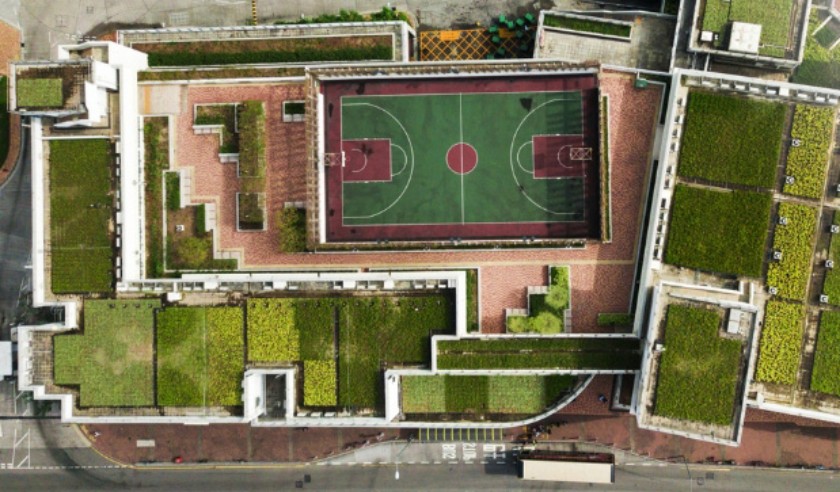 A high-angle view showcasing the interconnected green spaces and rainwater management system.